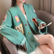 Net red cardigan sweater women's loose lazy air 2021 autumn and winter new student Korean knit jacket tide