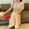 Temperament yellow floral dress female 2021 summer sweet formal design in bubble sleeve waist slide skirt